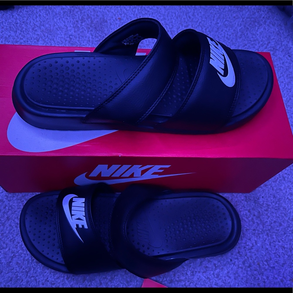 Nike WMNS Benassi Duo ultra slide. Brand new with tags. Size 11. Comes with box.